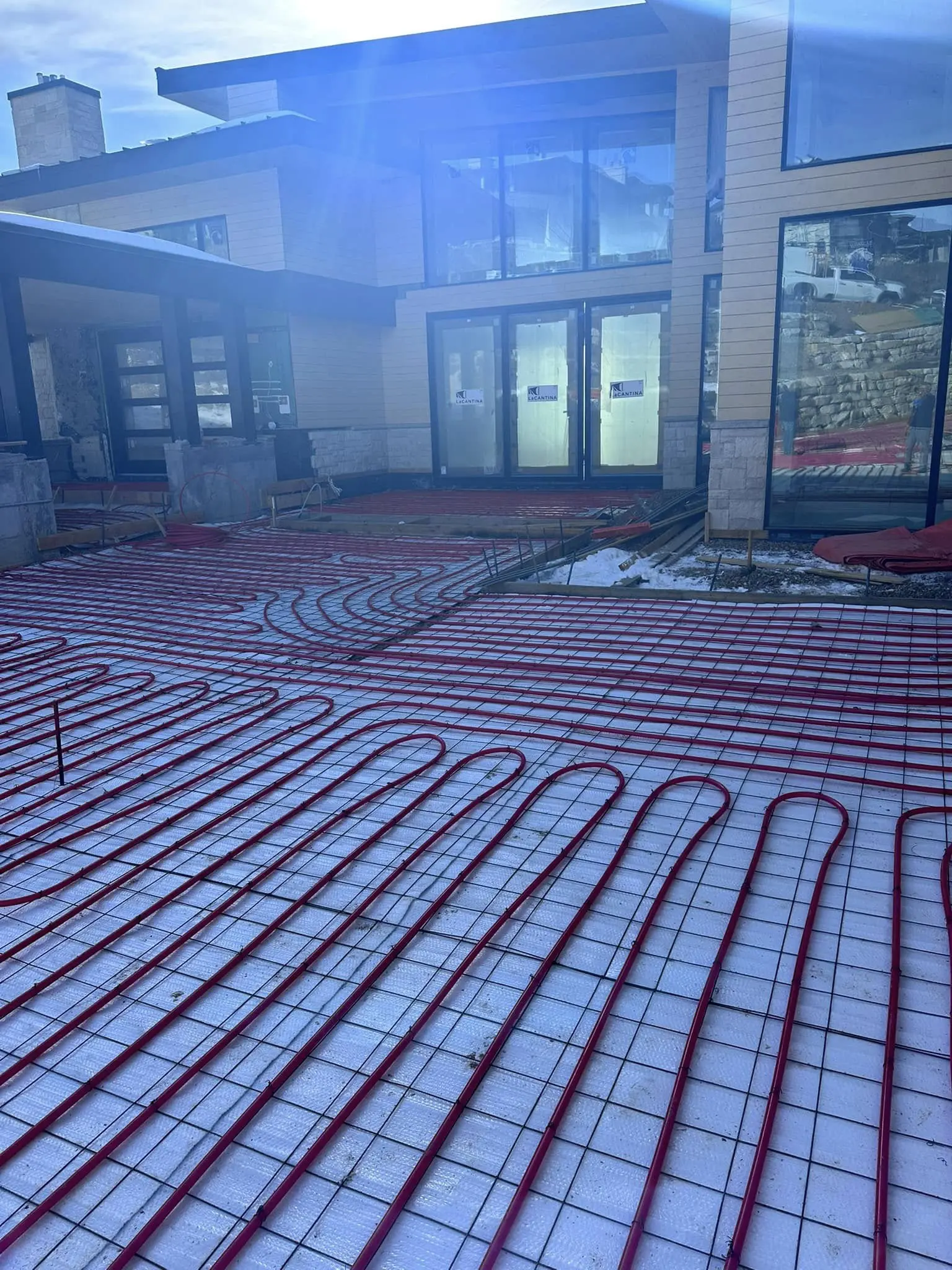 Building with outdoor radiant heating installation.